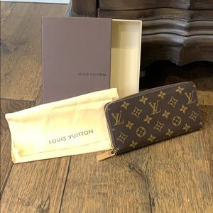 Louis Vuitton zippy wallet.